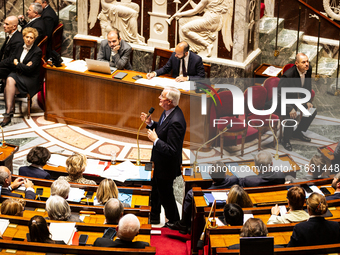 In Paris, France, on October 2, 2024, French Prime Minister Michel Barnier speaks at the National Assembly during a session of questions to...