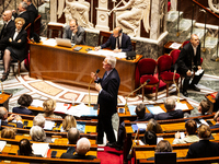 In Paris, France, on October 2, 2024, French Prime Minister Michel Barnier speaks at the National Assembly during a session of questions to...