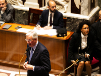 In Paris, France, on October 2, 2024, French Prime Minister Michel Barnier speaks at the National Assembly during a session of questions to...