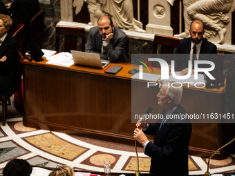 In Paris, France, on October 2, 2024, French Prime Minister Michel Barnier speaks at the National Assembly during a session of questions to...