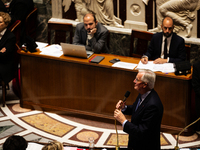 In Paris, France, on October 2, 2024, French Prime Minister Michel Barnier speaks at the National Assembly during a session of questions to...