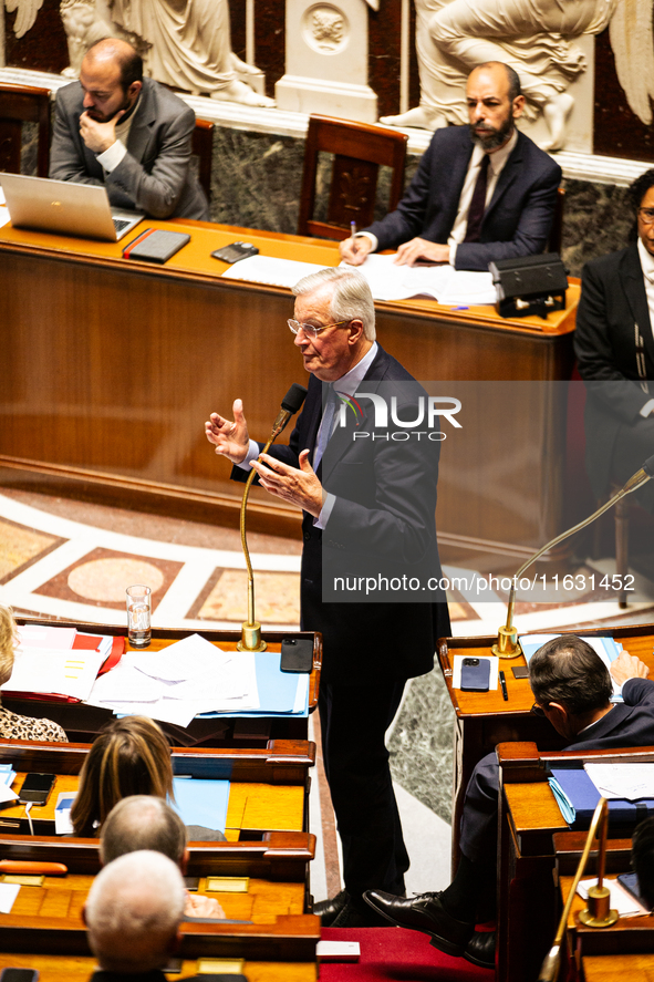 In Paris, France, on October 2, 2024, French Prime Minister Michel Barnier speaks at the National Assembly during a session of questions to...