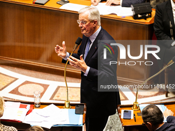 In Paris, France, on October 2, 2024, French Prime Minister Michel Barnier speaks at the National Assembly during a session of questions to...