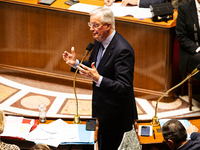 In Paris, France, on October 2, 2024, French Prime Minister Michel Barnier speaks at the National Assembly during a session of questions to...