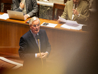 In Paris, France, on October 2, 2024, French Prime Minister Michel Barnier speaks at the National Assembly during a session of questions to...