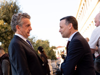 Stephen Dunbar-Johnson, the president of International of The New York Times Company, and Haris Doukas, the Mayor of Athens, participate in...