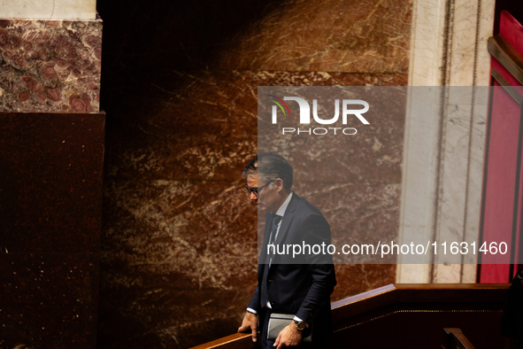 Olivier Faure, deputy of the Socialistes et Apparentes group, leaves the National Assembly during the session of questions to the government...