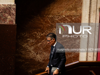 Olivier Faure, deputy of the Socialistes et Apparentes group, leaves the National Assembly during the session of questions to the government...