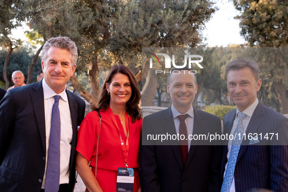 Achielas Tsaltas, the president of the Athens Democracy Forum, Haris Doukas, the Mayor of Athens, and Stephen Dunbar-Johnson, the president...