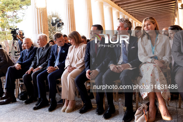 The President of the Hellenic Republic, Katerina Sakellaropoulou, Achielas Tsaltas, the president of the Athens Democracy Forum, Haris Douka...