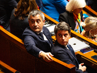 Gerald Darmanin, former Minister of the Interior, and Gabriel Attal, former Prime Minister, are seen during the session of questions to the...