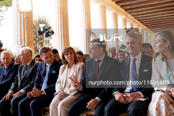 The President of the Hellenic Republic, Katerina Sakellaropoulou, Achielas Tsaltas, the president of the Athens Democracy Forum, Haris Douka...