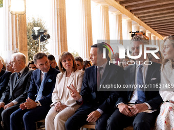 The President of the Hellenic Republic, Katerina Sakellaropoulou, Achielas Tsaltas, the president of the Athens Democracy Forum, Haris Douka...