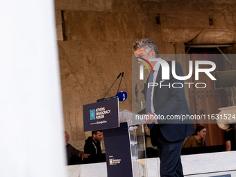 Stephen Dunbar-Johnson, the president of International of The New York Times Company, speaks at the Athens Democracy Forum. The President of...