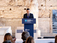 The Mayor of Athens, Haris Doukas, speaks at the Athens Democracy Forum. The President of the Hellenic Republic, Katerina Sakellaropoulou, r...