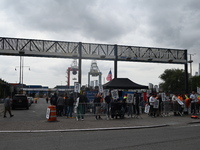 Longshoremen carry signs and demonstrate to make their voices heard outside Red Hook Terminal in Brooklyn, New York, United States, on Octob...