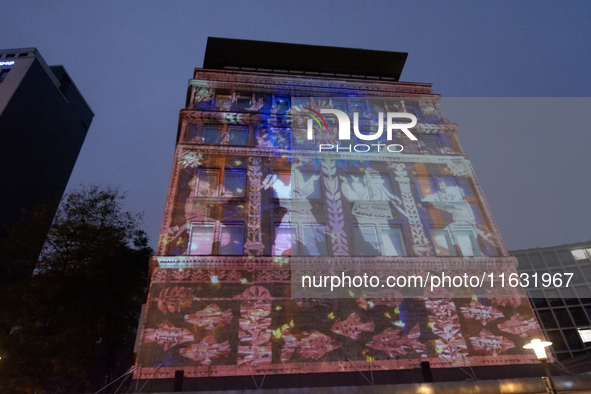 The creative production studio Kurbas Pro from Ukraine projects a video map during the opening of the Essen Light Festival 2024 in Essen, Ge...