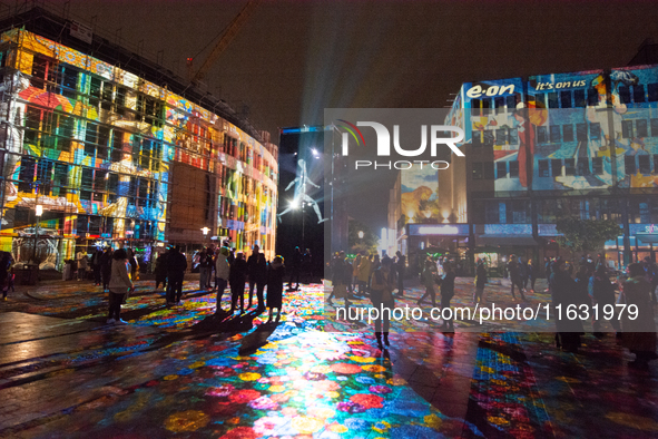 German artist DANIEL MARGRAF's projection is seen at Kennedy Square during the opening of the Essen Light Festival 2024 in Essen, Germany, o...