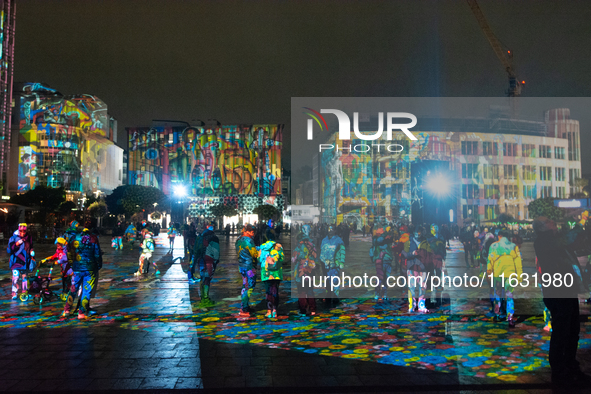 German artist DANIEL MARGRAF's projection is seen at Kennedy Square during the opening of the Essen Light Festival 2024 in Essen, Germany, o...