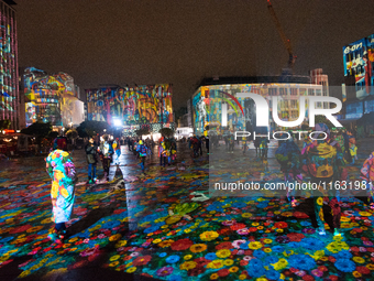 German artist DANIEL MARGRAF's projection is seen at Kennedy Square during the opening of the Essen Light Festival 2024 in Essen, Germany, o...