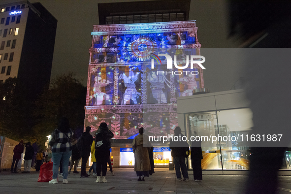 The creative production studio Kurbas Pro from Ukraine projects a video map during the opening of the Essen Light Festival 2024 in Essen, Ge...