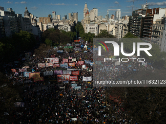 University students, unions, and social groups gather during a protest against Argentina's President Javier Milei's promise to veto a law to...