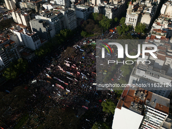 University students, unions, and social groups gather during a protest against Argentina's President Javier Milei's promise to veto a law to...