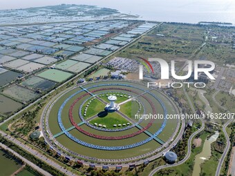 Participants take part in a fishing contest at Sihong International Round Pond in Suqian, China, on October 2, 2024. (