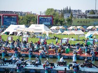 Participants take part in a fishing contest at Sihong International Round Pond in Suqian, China, on October 2, 2024. (