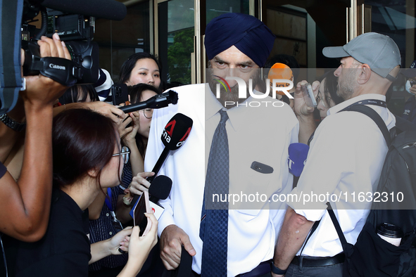 Davinder Singh, the defense counsel of Singapore's former Transport Minister S. Iswaran, leaves the Supreme Court in Singapore, on October 3...