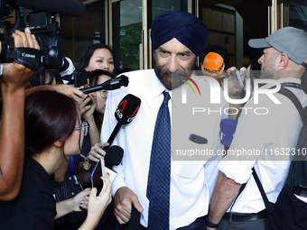 Davinder Singh, the defense counsel of Singapore's former Transport Minister S. Iswaran, leaves the Supreme Court in Singapore, on October 3...