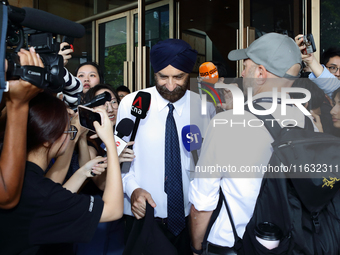 Davinder Singh, the defense counsel of Singapore's former Transport Minister S. Iswaran, leaves the Supreme Court in Singapore, on October 3...