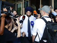 Davinder Singh, the defense counsel of Singapore's former Transport Minister S. Iswaran, leaves the Supreme Court in Singapore, on October 3...