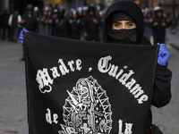 Members of the Anarchist Black Bloc march in Mexico City, Mexico, on October 2, 2024, on the 56th anniversary of the Tlatelolco Massacre tha...