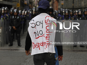 Members of the Anarchist Black Bloc march in Mexico City, Mexico, on October 2, 2024, on the 56th anniversary of the Tlatelolco Massacre tha...