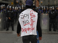 Members of the Anarchist Black Bloc march in Mexico City, Mexico, on October 2, 2024, on the 56th anniversary of the Tlatelolco Massacre tha...