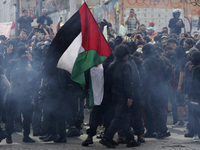 Members of the Anarchist Black Bloc march in Mexico City, Mexico, on October 2, 2024, on the 56th anniversary of the Tlatelolco Massacre tha...