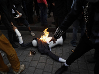 Members of the Bloque Negro Anarquista (Anarchist Black Bloc) take action on establishments in Mexico City, Mexico, on October 2, 2024, duri...