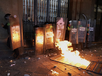 Members of the Anarchist Black Bloc clash with police during the march to mark the 56th anniversary of the Tlatelolco Massacre, which starts...