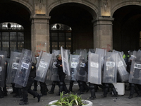 Members of the Anarchist Black Bloc clash with police during the march to mark the 56th anniversary of the Tlatelolco Massacre, which starts...