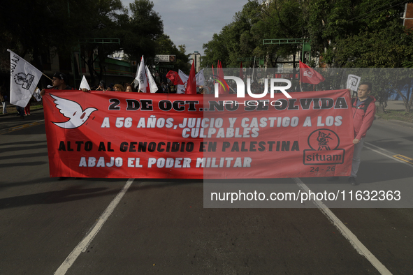 Members of the Comite 68 and various organizations march from the Plaza de las Tres Culturas in Tlatelolco to the Zocalo in Mexico City, Mex...