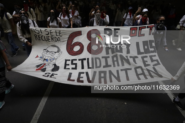 Members of the Comite 68 and various organizations march from the Plaza de las Tres Culturas in Tlatelolco to the Zocalo in Mexico City, Mex...