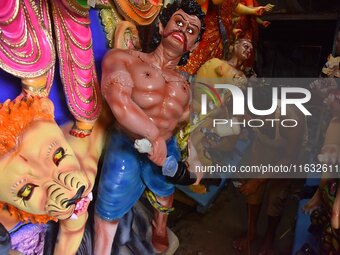 Artisans prepare idols ahead of the Durga Puja festival in Nagaon District of Assam, India, on October 3, 2024. (