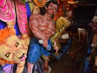 Artisans prepare idols ahead of the Durga Puja festival in Nagaon District of Assam, India, on October 3, 2024. (