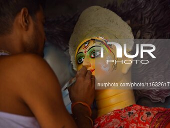 Artisans prepare idols of the Hindu goddess Durga ahead of the Durga Puja festival in Nagaon District, Assam, India, on October 3, 2024. (