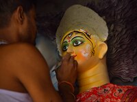 Artisans prepare idols of the Hindu goddess Durga ahead of the Durga Puja festival in Nagaon District, Assam, India, on October 3, 2024. (