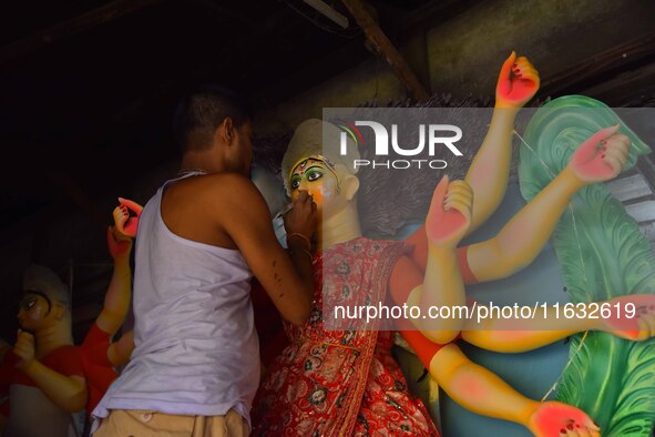 Artisans prepare idols of the Hindu goddess Durga ahead of the Durga Puja festival in Nagaon District, Assam, India, on October 3, 2024. 