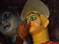 Artisans prepare idols of the Hindu goddess Durga ahead of the Durga Puja festival in Nagaon District, Assam, India, on October 3, 2024. (