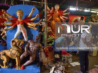 Artisans prepare idols of the Hindu goddess Durga ahead of the Durga Puja festival in Nagaon District, Assam, India, on October 3, 2024. (