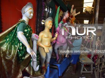 Artisans prepare idols of the Hindu goddess Durga ahead of the Durga Puja festival in Nagaon District, Assam, India, on October 3, 2024. (